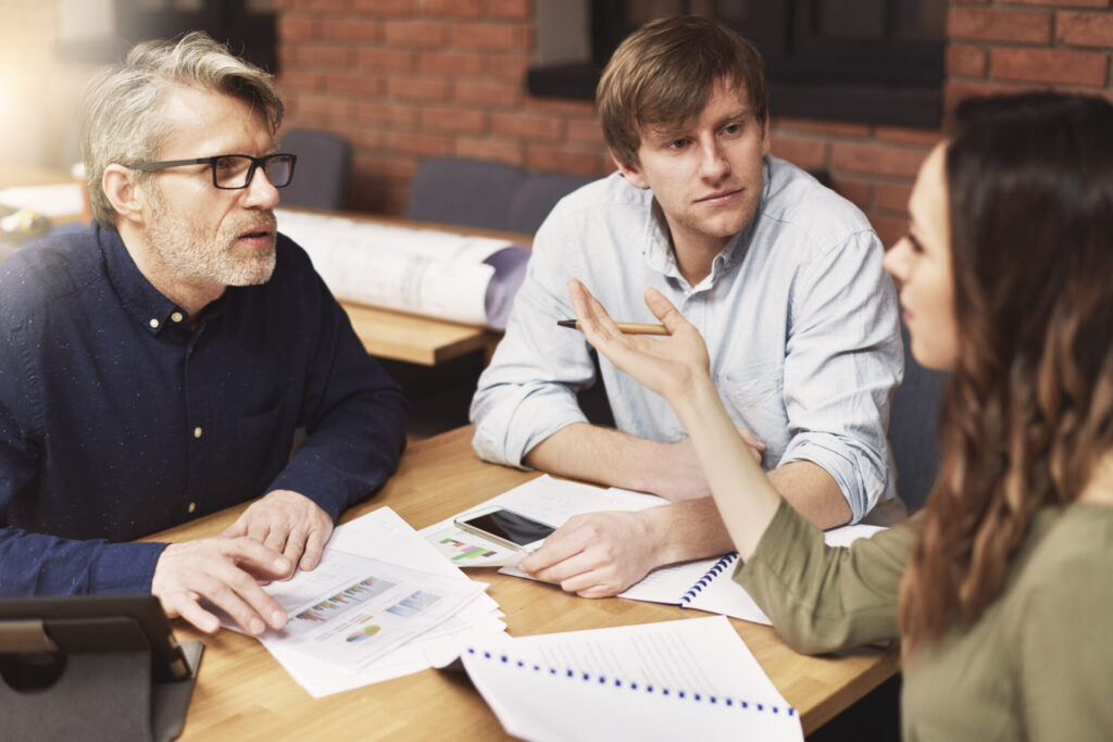 "Early debt mediation strategy meeting to avoid business default"